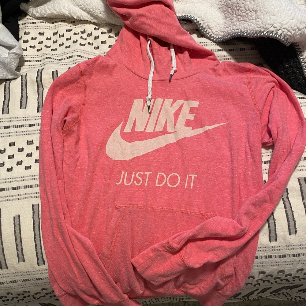 Bright pink Nike hoodie